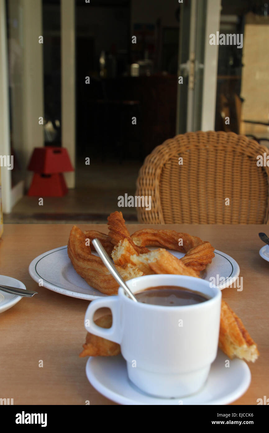 Churros con Chocolate Stockfoto