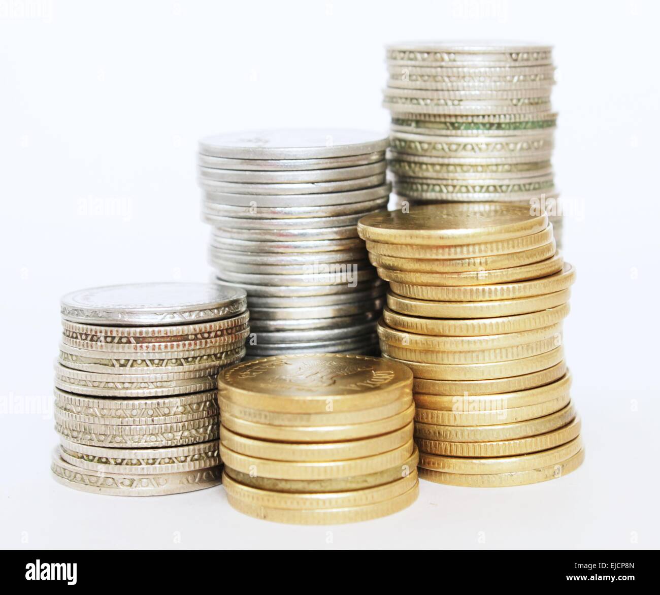 Geldmengenwachstum mit Gold- und Silbermünzen Stockfoto