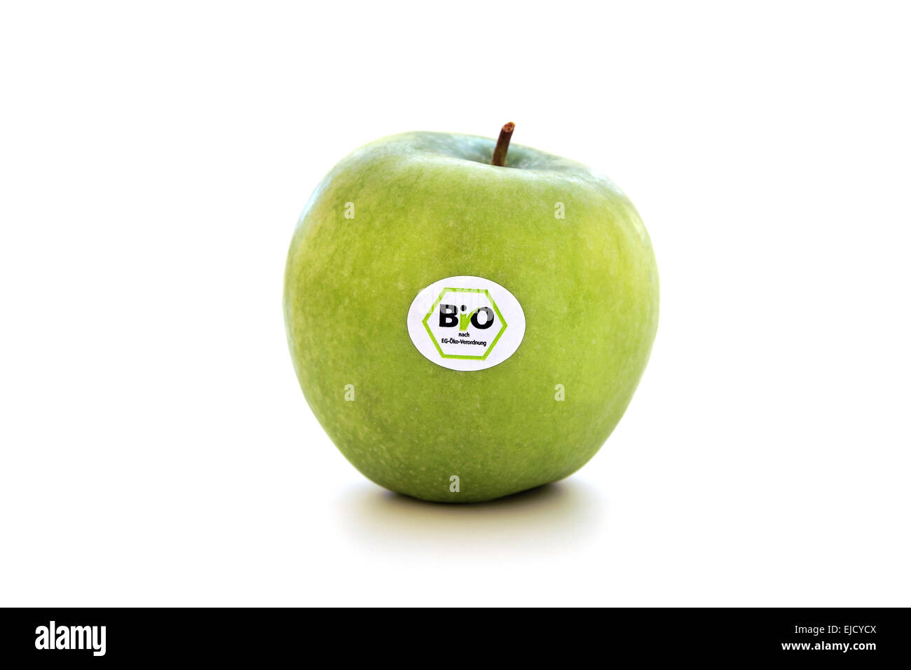 Grüner Apfel mit Bio-Siegel Stockfoto