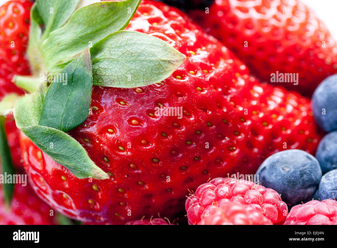 Erdbeerobst üppige Erdbeere Nahaufnahme, Konsistenz, Obst, lecker, Erdbeere Stockfoto