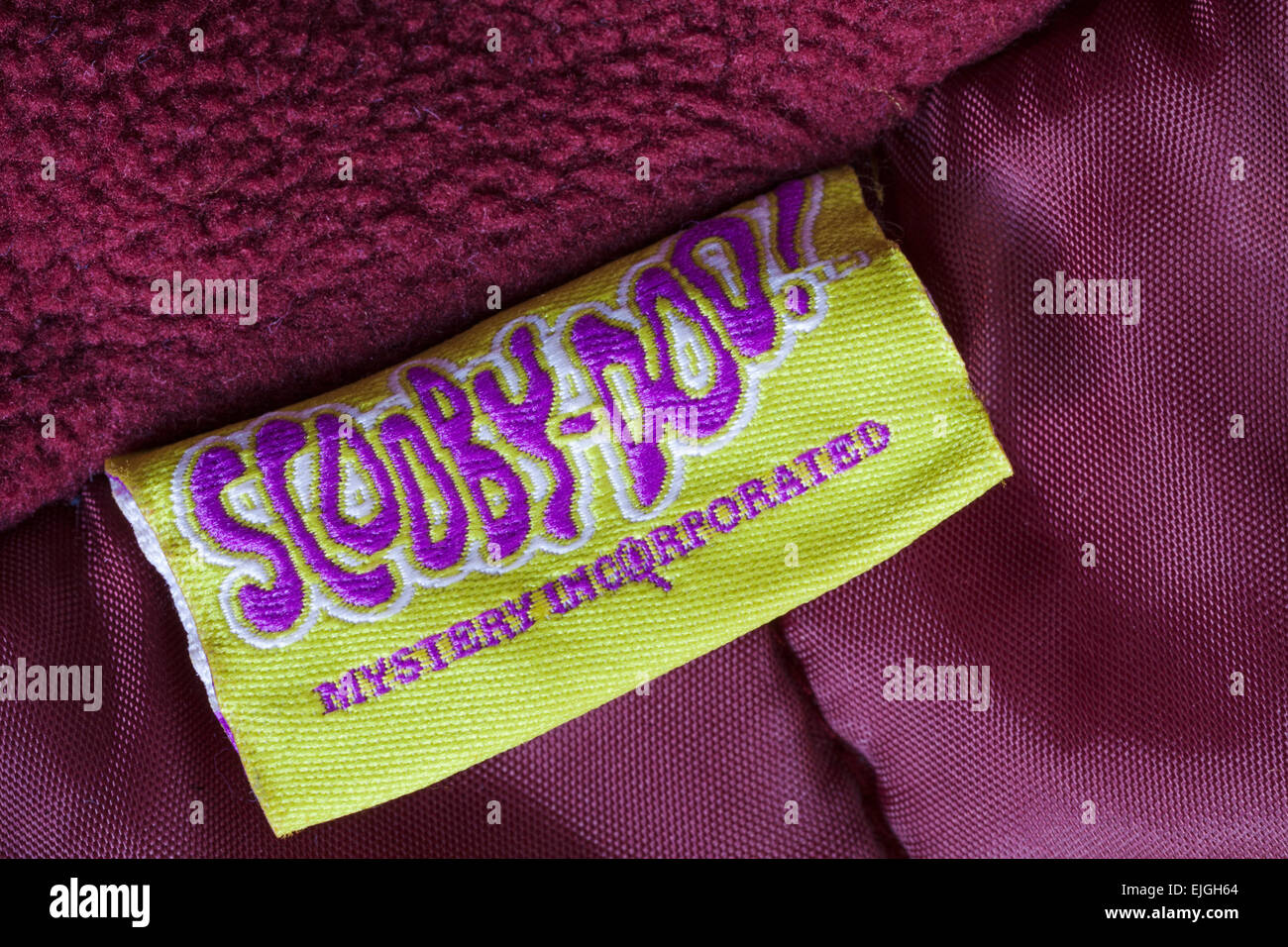 Scooby-Doo Mystery Incorporated Label in junge Mädchen Mantel Stockfoto
