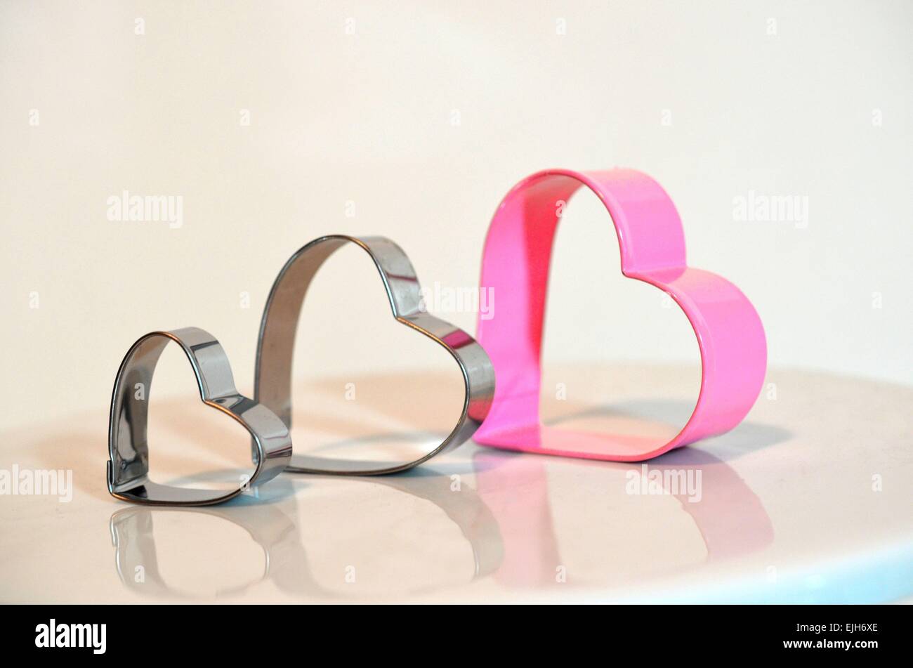 Pink und Silber Herzen. Feiern Romantik, Valentines Tag, Liebe Stockfoto