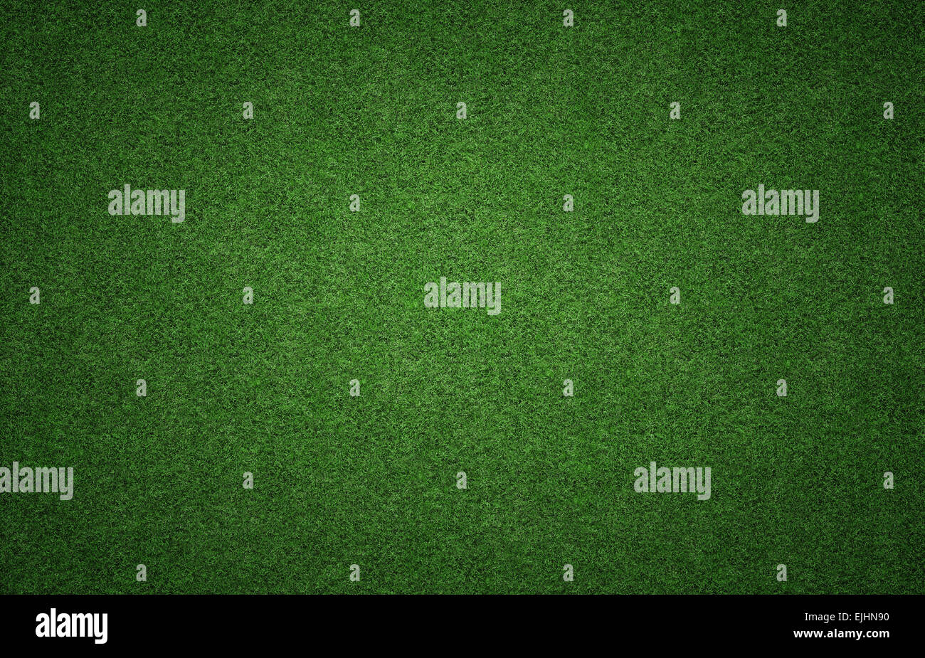 Grasgrün Hintergrundtextur Grunge Beleuchtung mit vielen Textfreiraum. Perfekt für Sport-designs Stockfoto