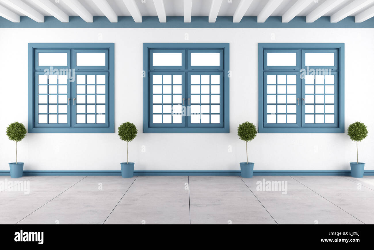 Weißen und blauer leerer Raum mit drei Fenstern - 3D Rendering Stockfoto