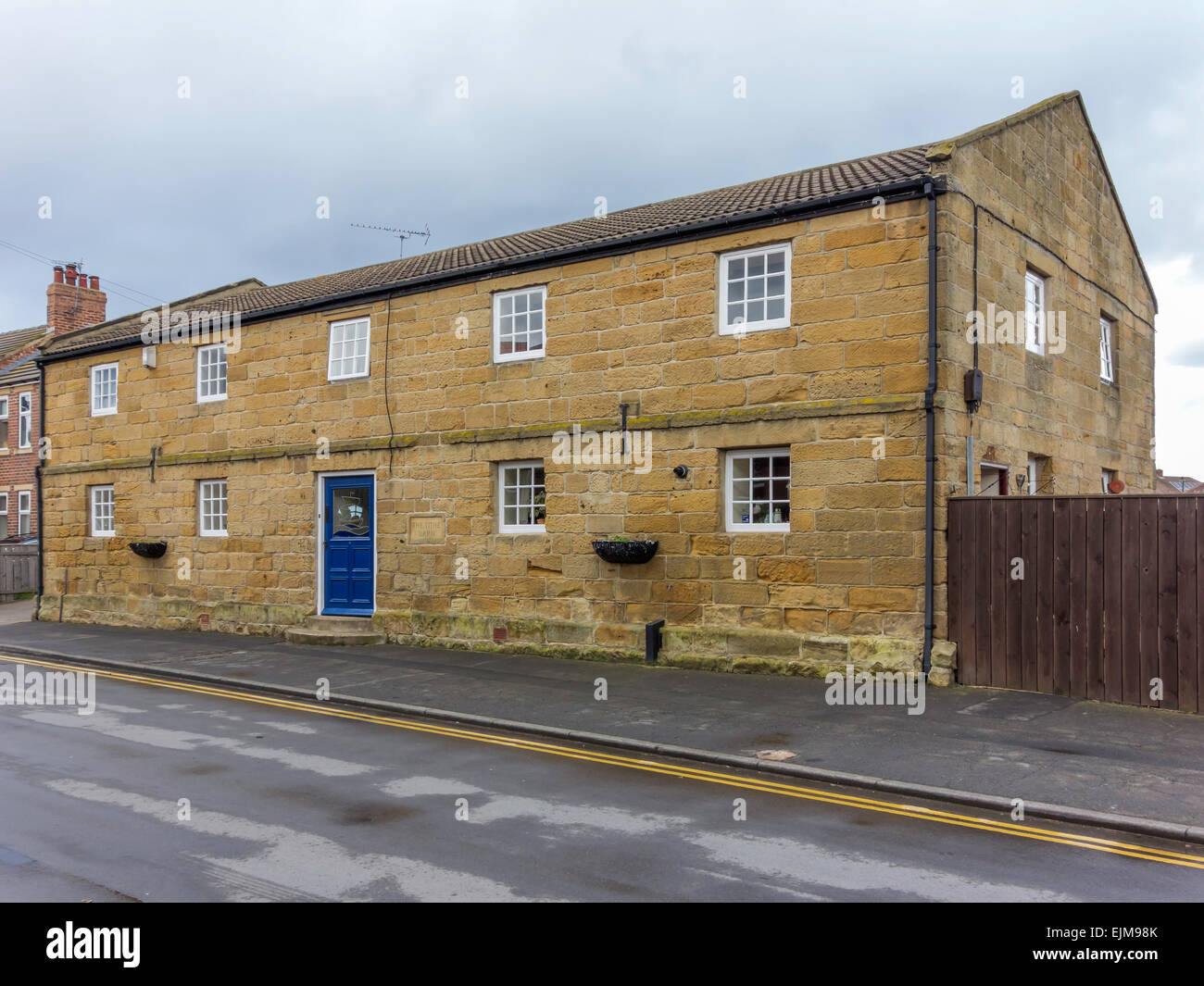 Die Zehntscheune aufgeführt eine 18 C Klasse 2 Gebäude in Marske am Meer ehemaliges Lagerhaus jetzt ein Wohnhaus Stockfoto