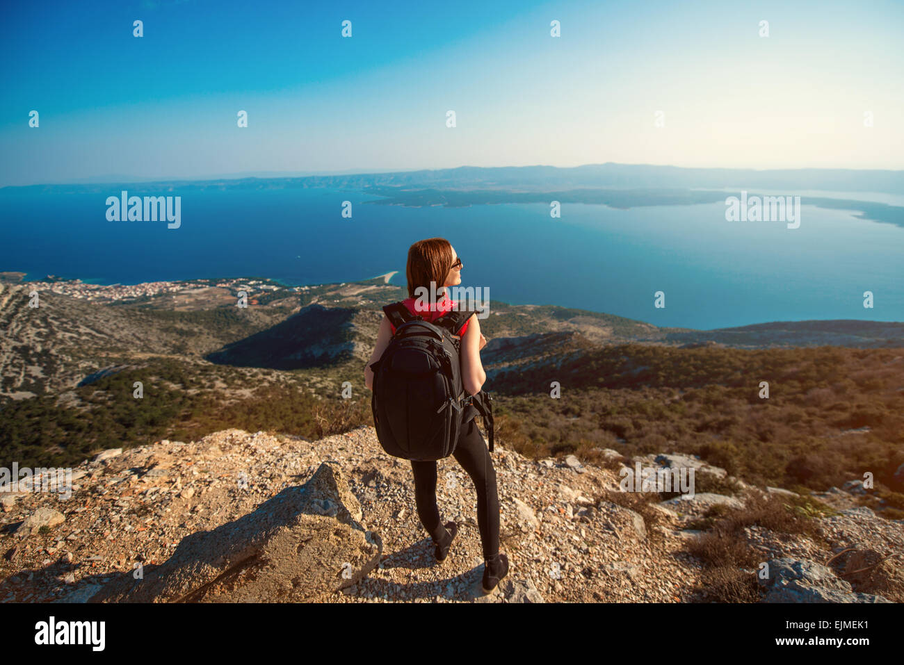 Frau an der Spitze der Insel reisen Stockfoto