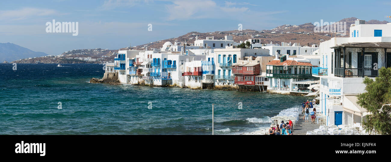 Mykonos, Griechenland Restaurant Häuser mediterrane Bucht panorama Stockfoto