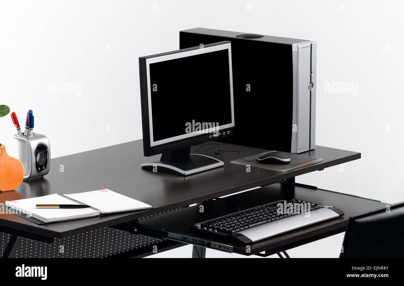 Desktop-Computer auf den Arbeitstisch der wichtigen Business-tool Stockfoto