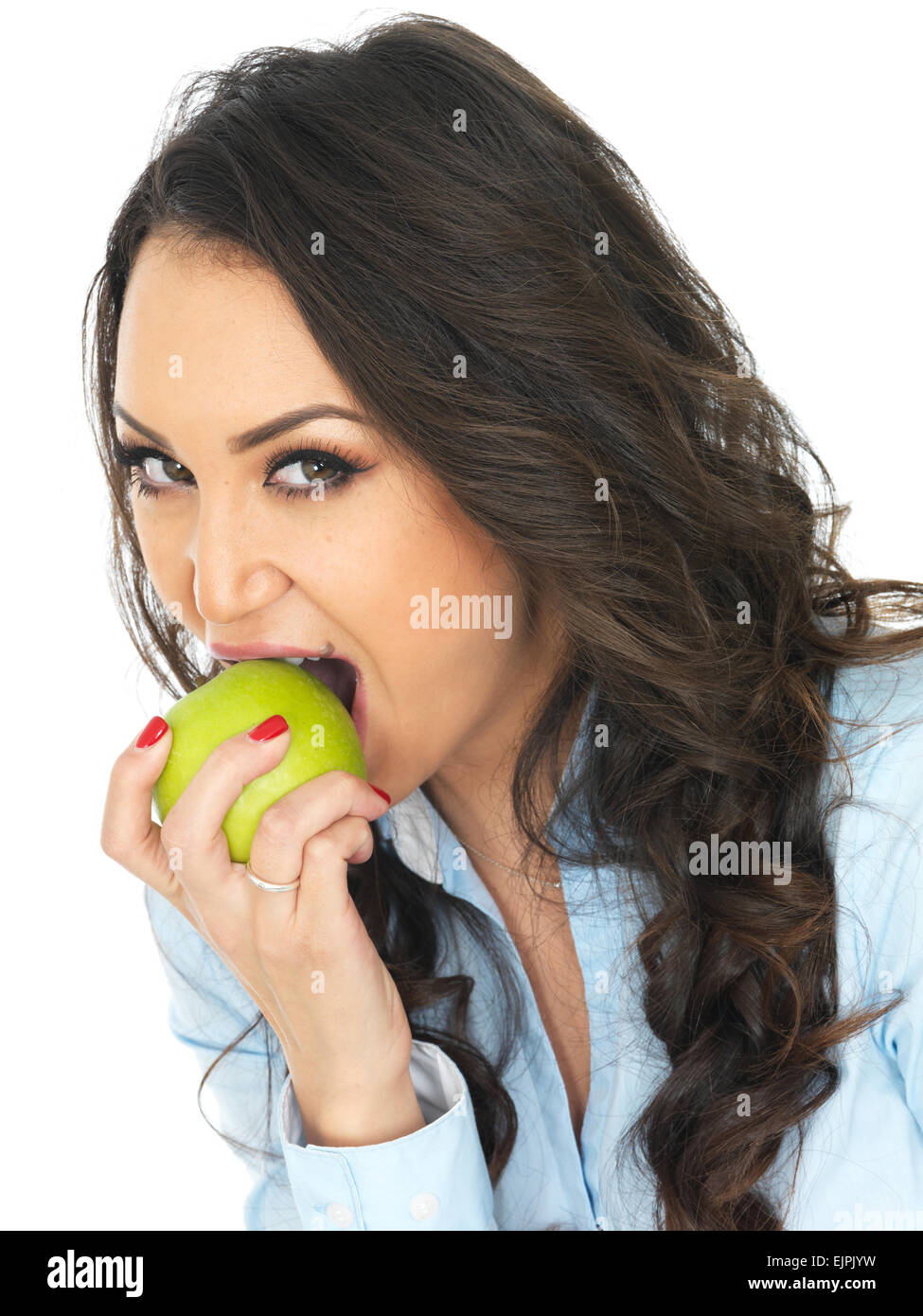 Junge attraktive Frau das Essen eines Apple Stockfoto