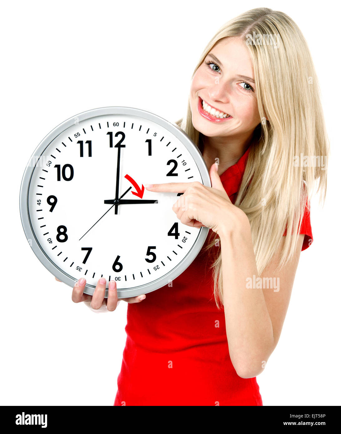 Junge Frau mit einer Uhr. Zeit-Management-Konzept. Sommerzeit (Daylight Saving Time) Stockfoto