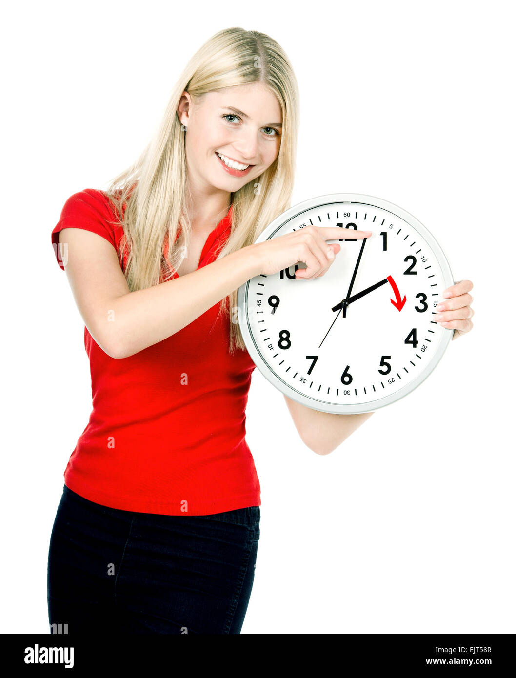 Zeit-Management-Konzept. Daylight Saving Time. Junge lächelnde Frau mit einer Uhr Stockfoto