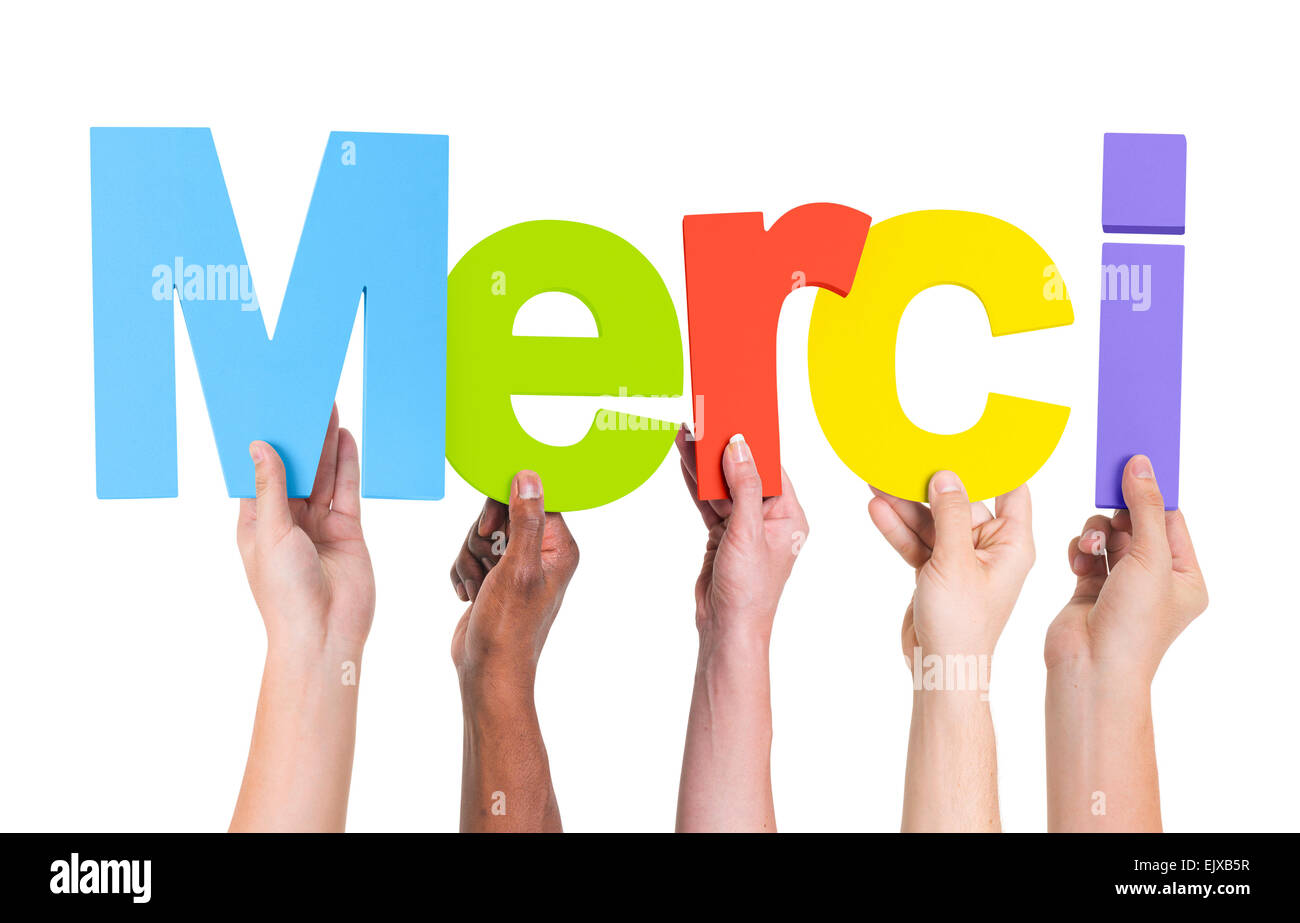 Gruppe von multiethnischen Hände halten Merci Stockfoto