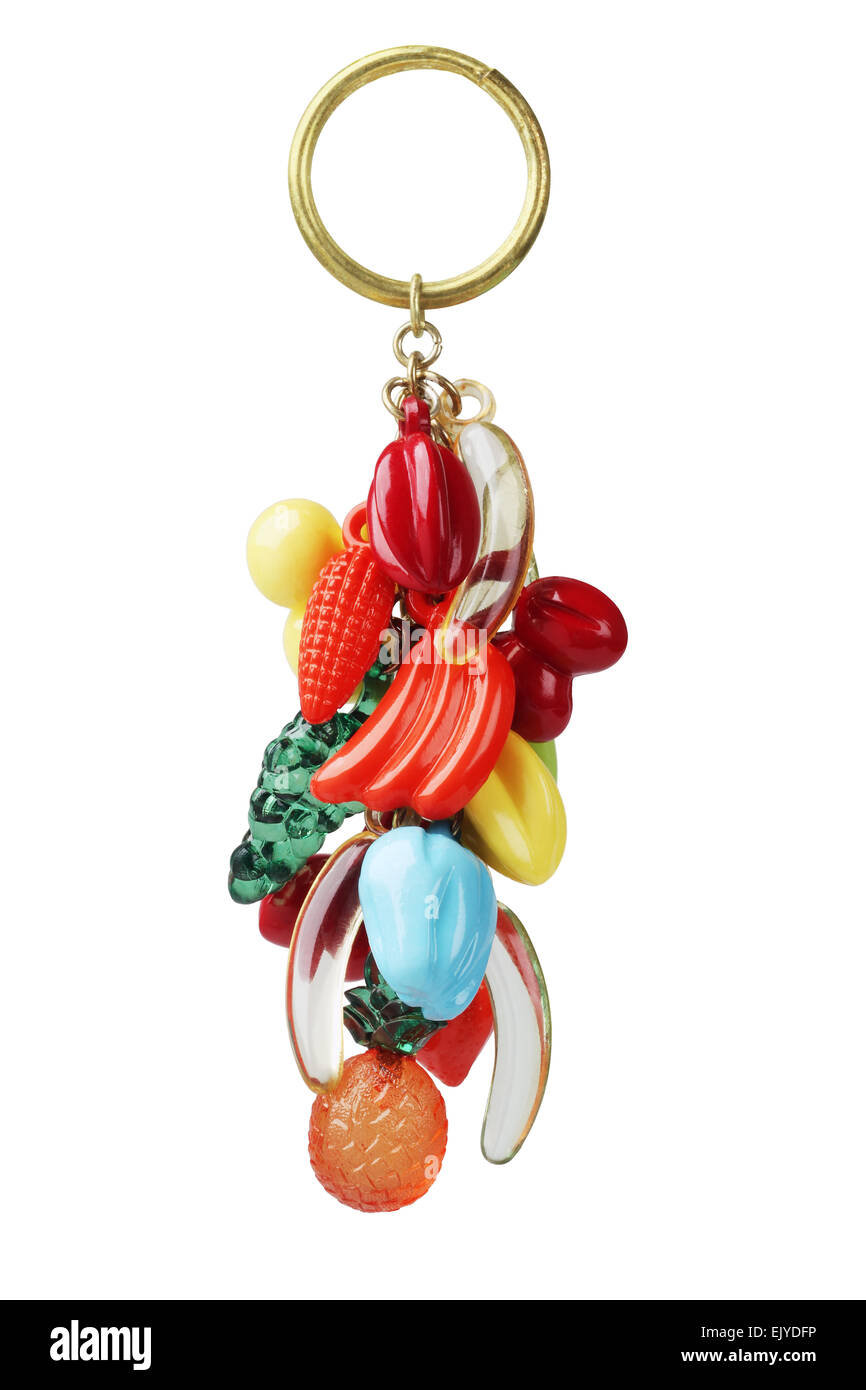 Schlüsselanhänger mit Kunststoff Früchte Schmuckstück auf weißem Hintergrund Stockfoto