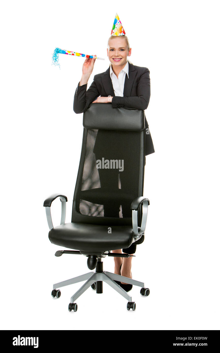 blonde Unternehmerin Lächeln und Spaß während einer Party im Büro Stockfoto