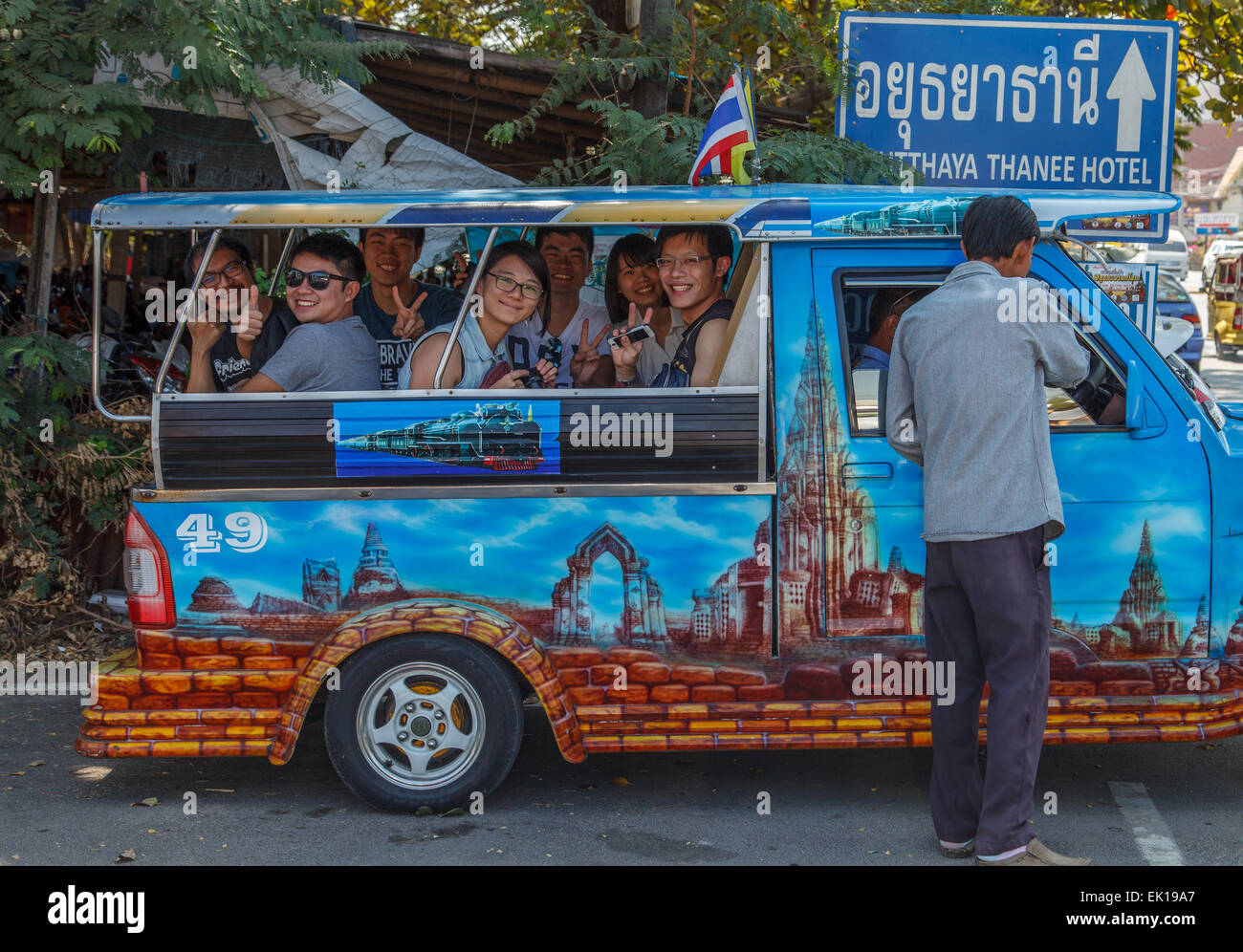 Eine Gruppe von chinesischen Touristen auf einem Tuk-tuk Stockfoto