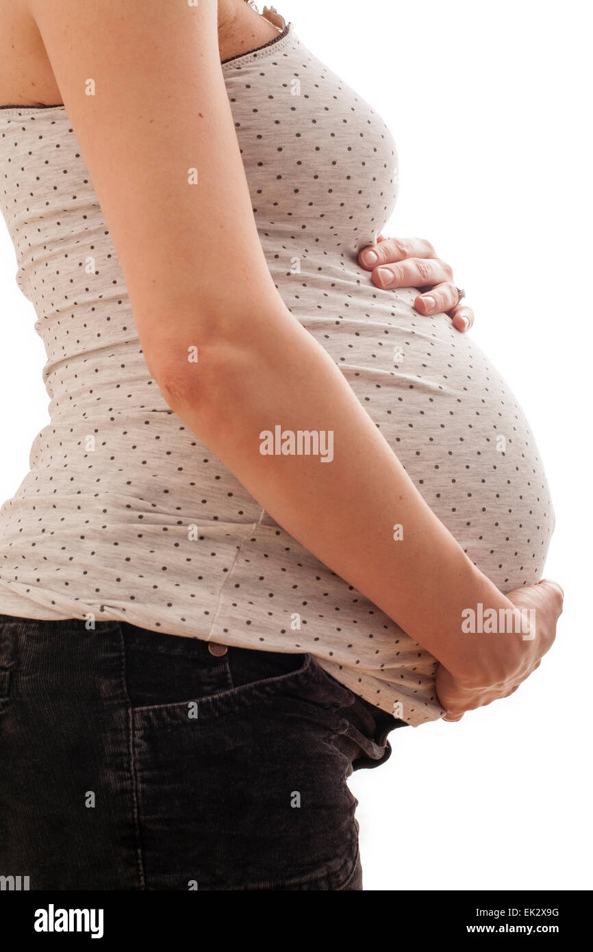 39 Jahre alte hochschwangere Frau in ihren späten 30er Jahren. Stockfoto