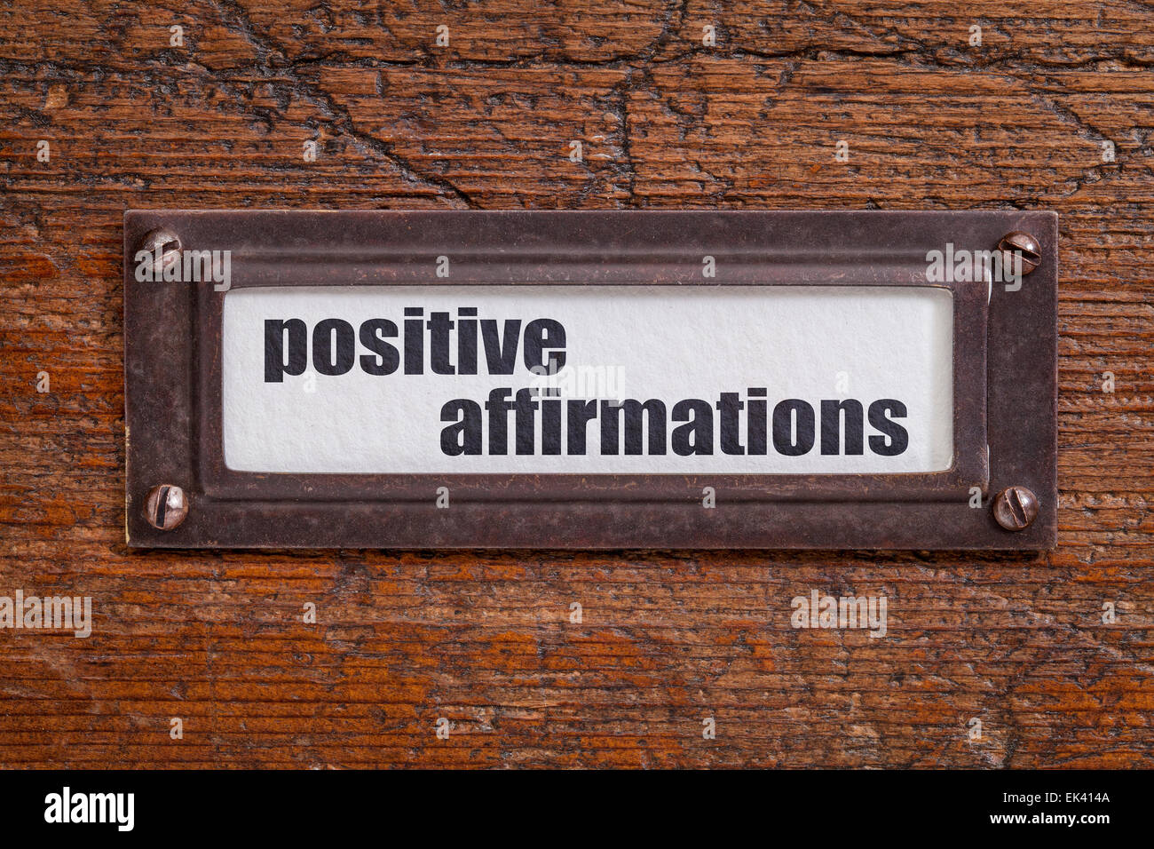 positive Affirmationen - CAB-Datei Label, Bronze Inhaber gegen Grunge und zerkratzten Holz Stockfoto