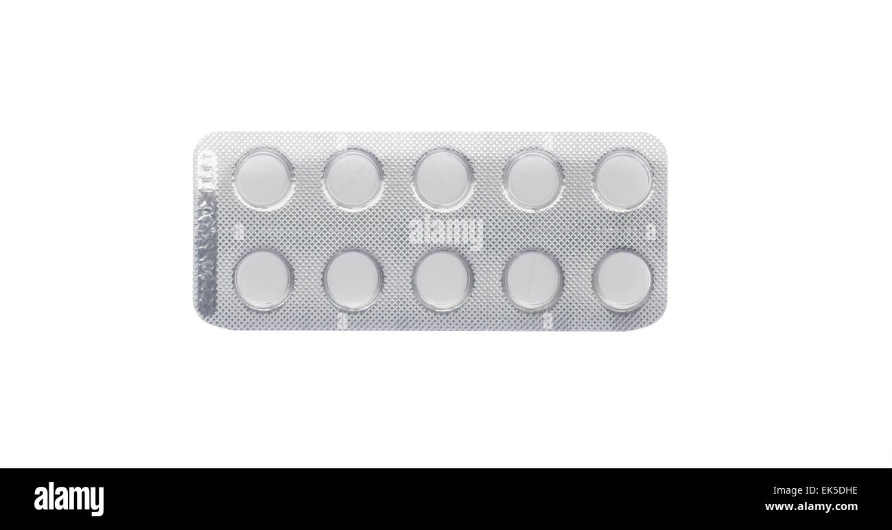 Weißen Pillen in einem Blister Pack auf einem isolierten Hintergrund Stockfoto