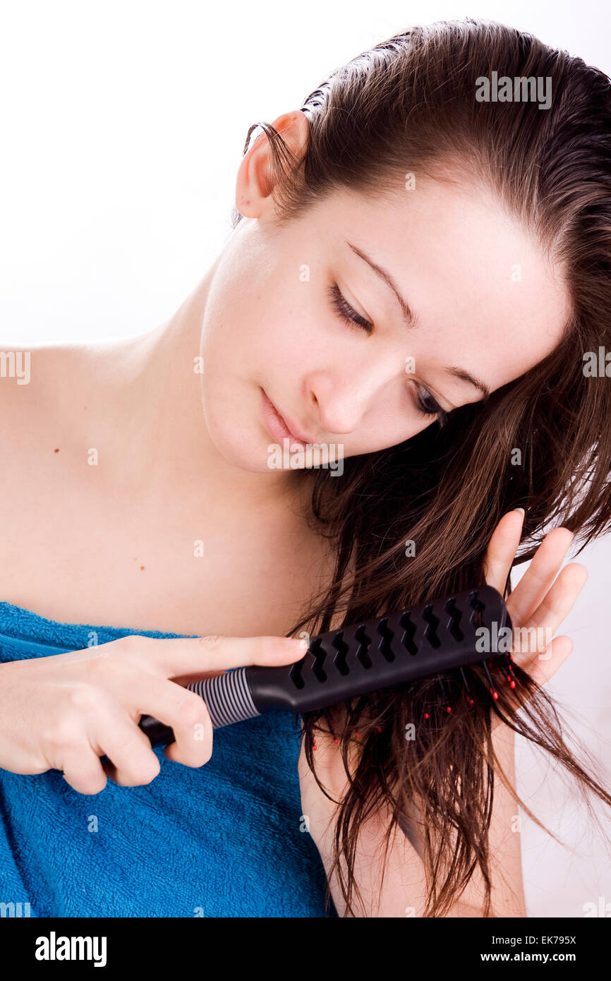 Bürsten Sie ihr Haar Stockfoto