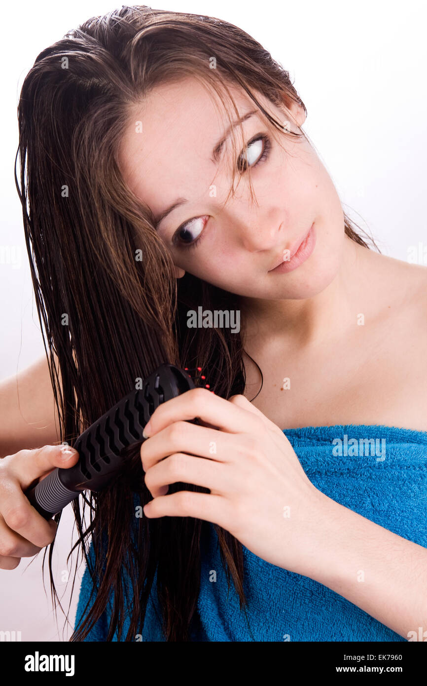 Frau sucht an den Haaren Stockfoto