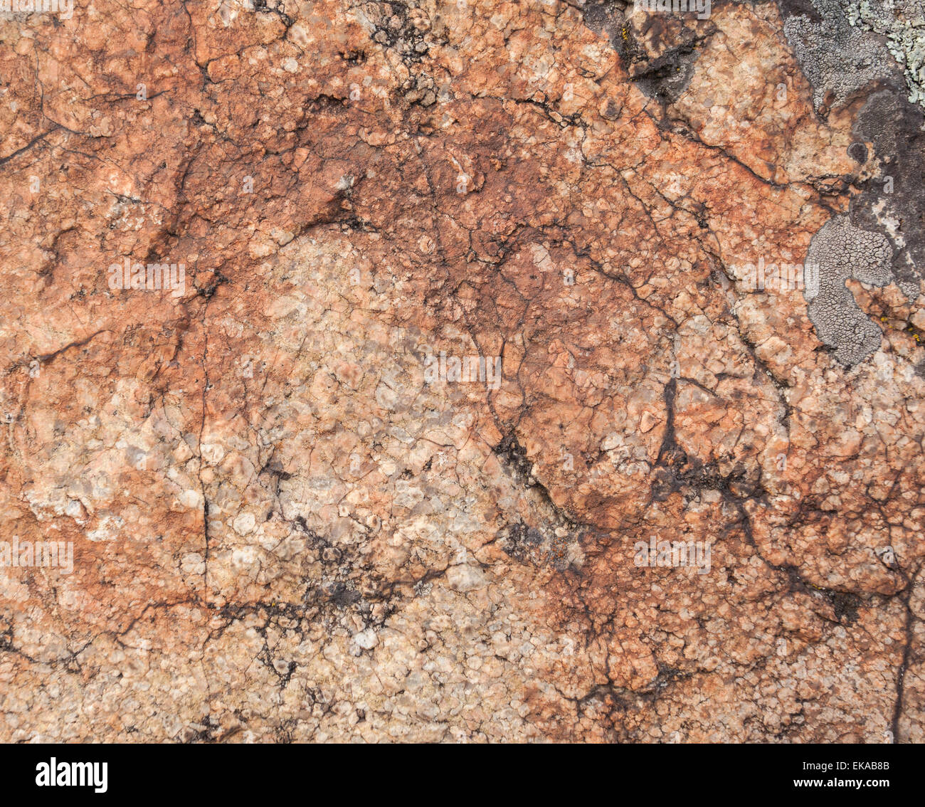 Naturgranit Steinstruktur Hintergrund. Rau und rostig. Close-up, Makro Stockfoto