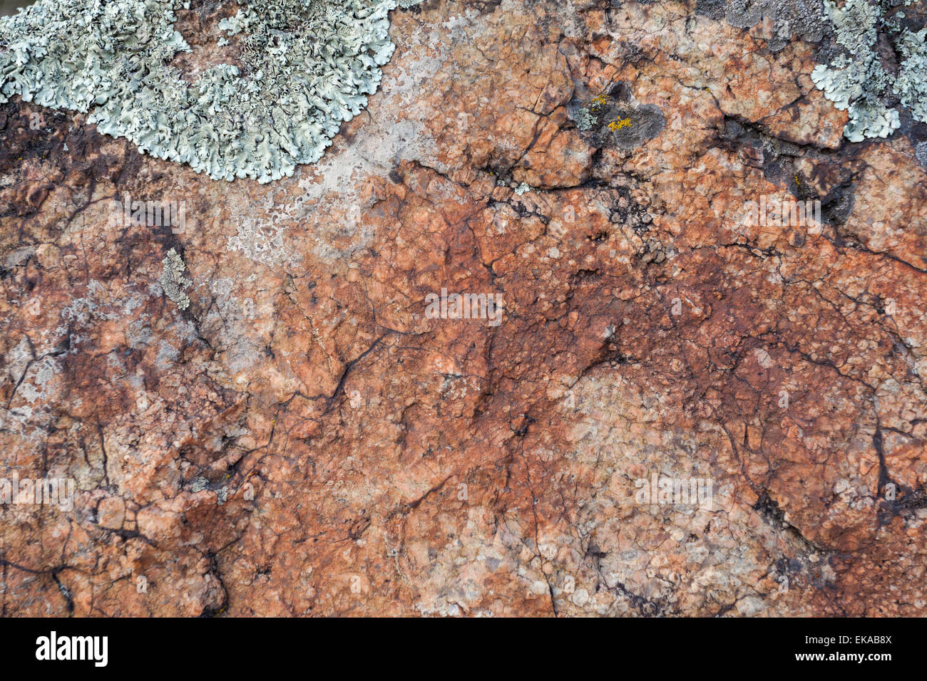 Naturgranit Steinstruktur Hintergrund. Rau und rostig. Close-up, Makro Stockfoto