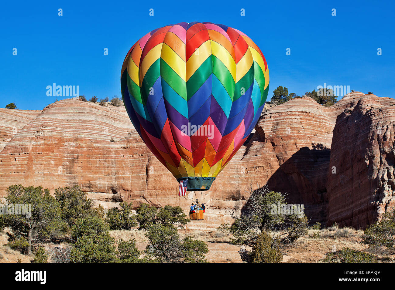 Der Red Rock Ballon Rallye findet am ersten Wochenende im Dezember im Red Rock State Park in der Nähe von Gallup, New Mexico. Stockfoto