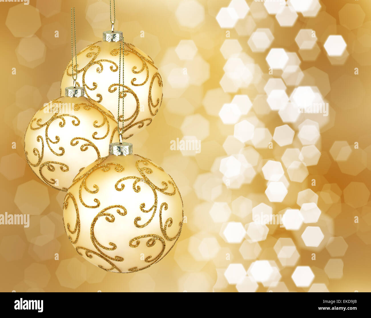 Drei schöne goldene Weihnachtskugeln Stockfoto