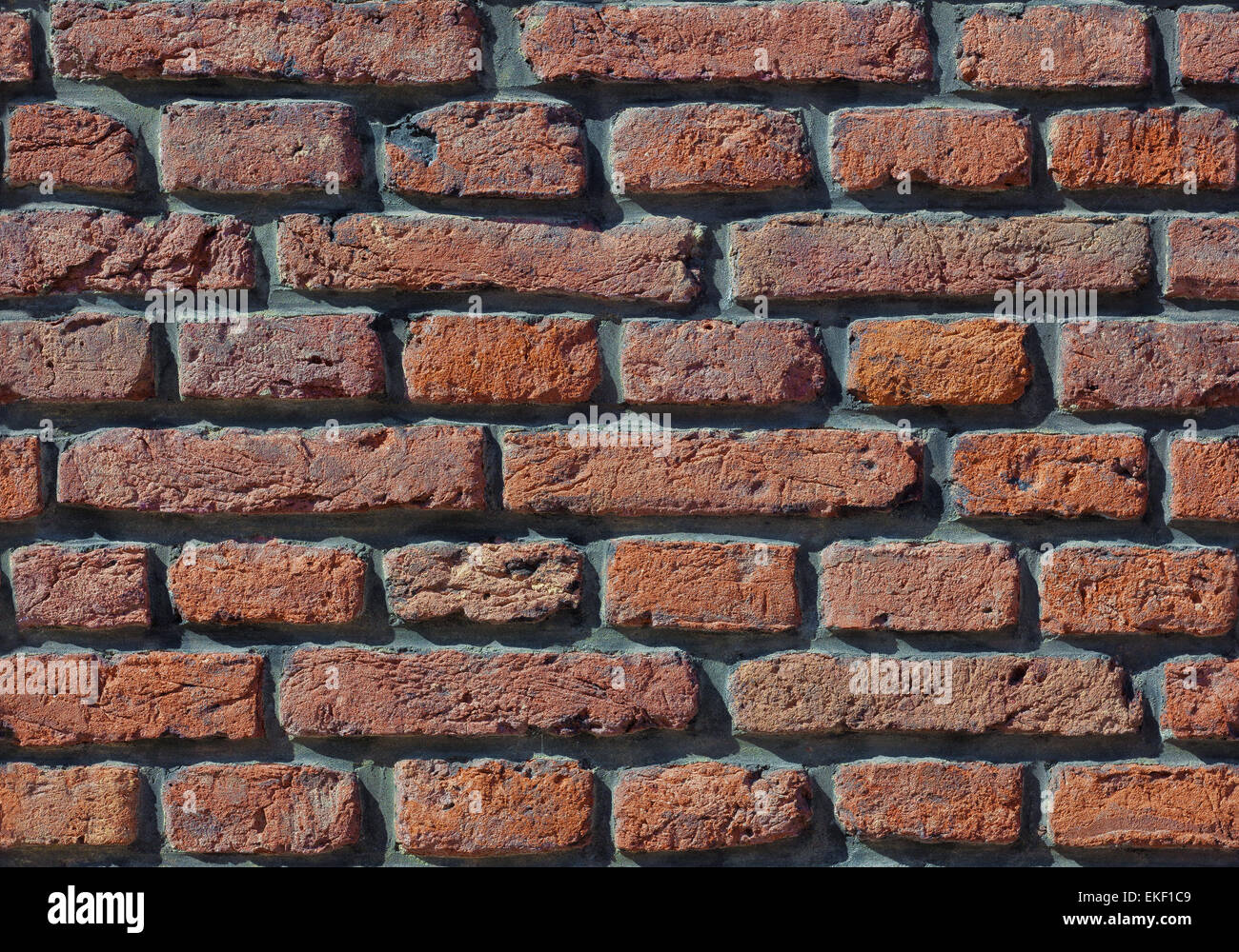 Aneinander aus rotem Backstein-Grunge-Wand-Hintergrund Stockfoto