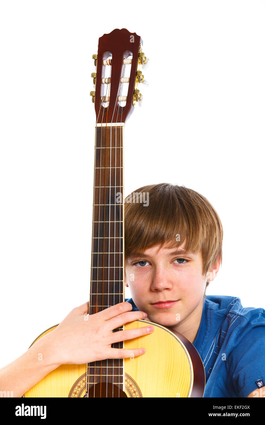 Junge mit der klassischen spanischen Gitarre Stockfoto