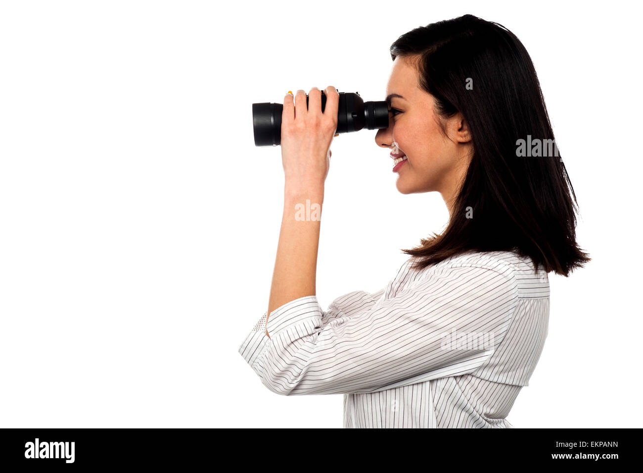 Corporate Frau anzeigen durch ein Fernglas Stockfoto