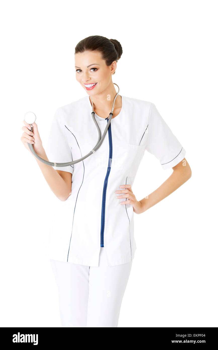 Krankenschwester oder junger Arzt stand lächelnd. Stockfoto