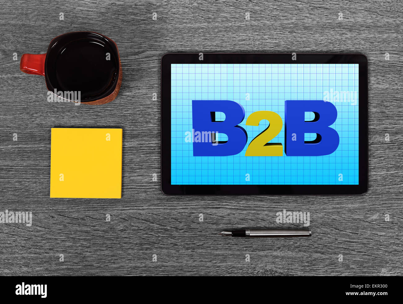 Touchpad mit b2b auf grauen Tisch Stockfoto
