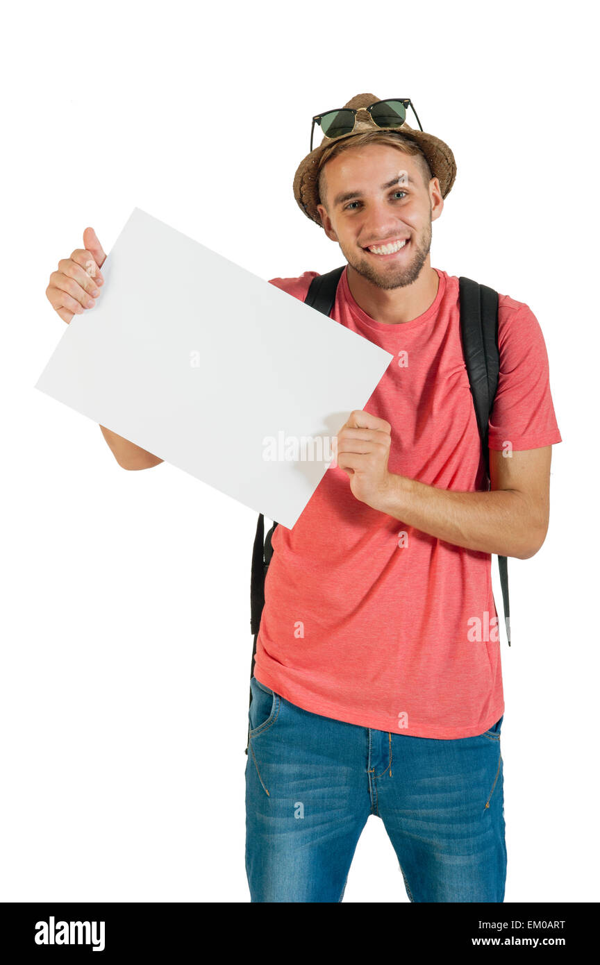 Junger happy Tourist hält eine weiße Pinnwand Stockfoto
