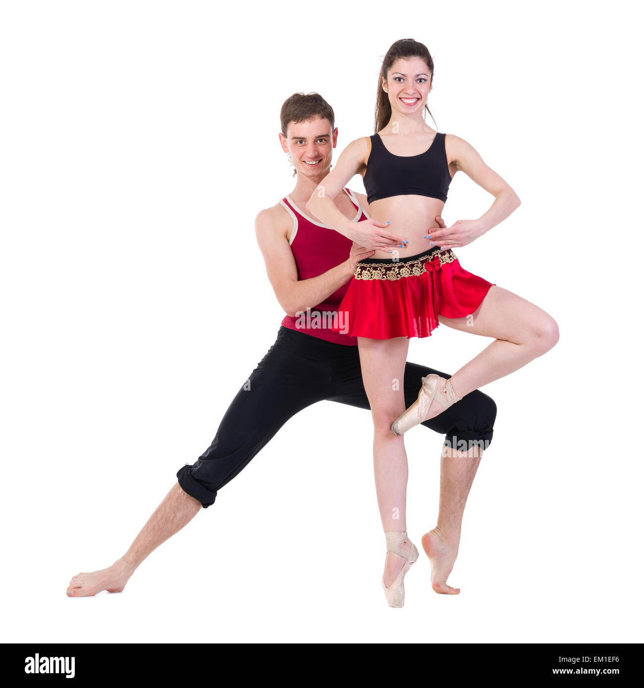 Volle Länge des jungen Balletts Paare tanzen auf weißem Hintergrund Stockfoto
