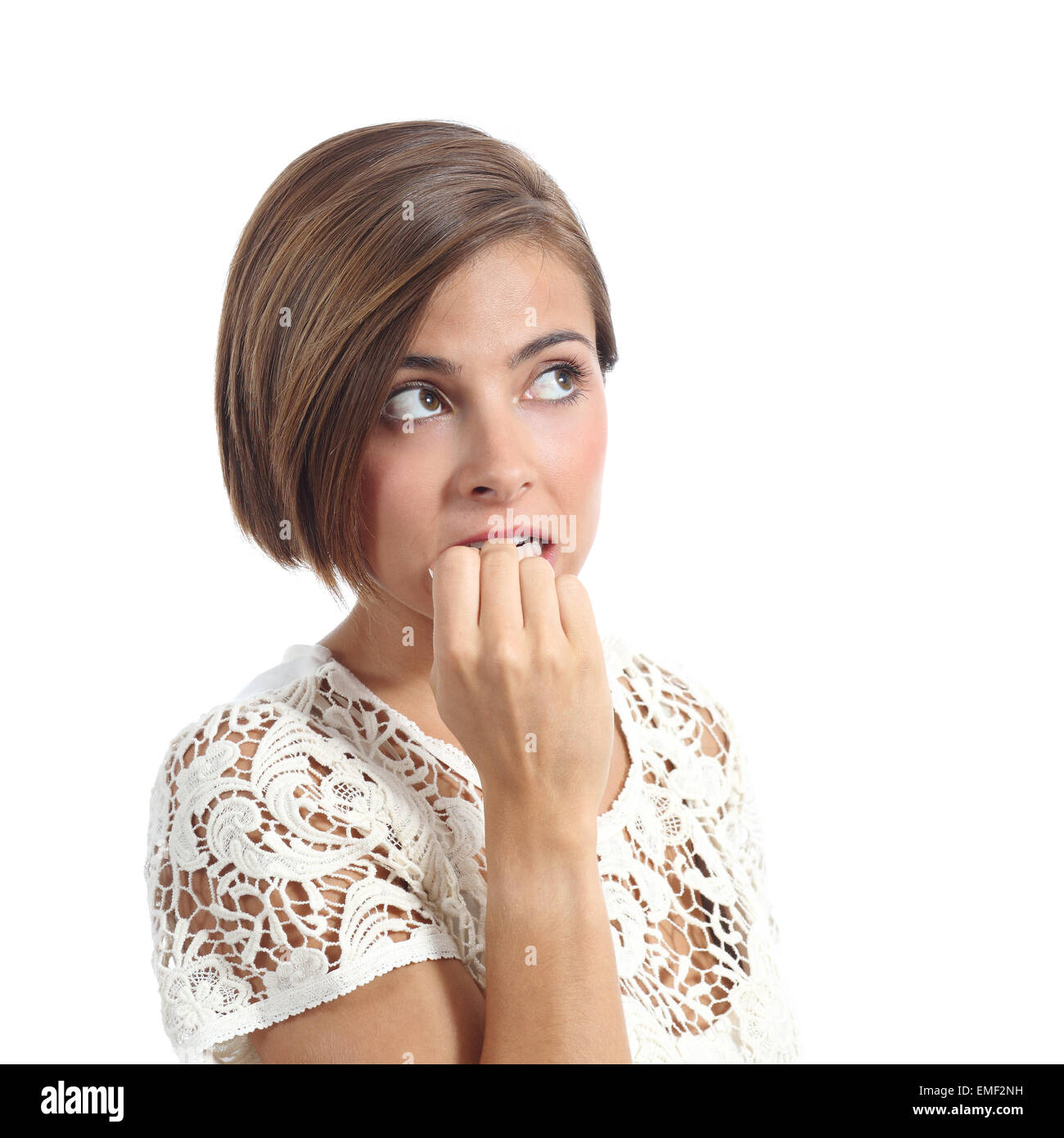 Nervös nachdenkliche Frau Beißen Nägel isoliert auf weißem Hintergrund Stockfoto