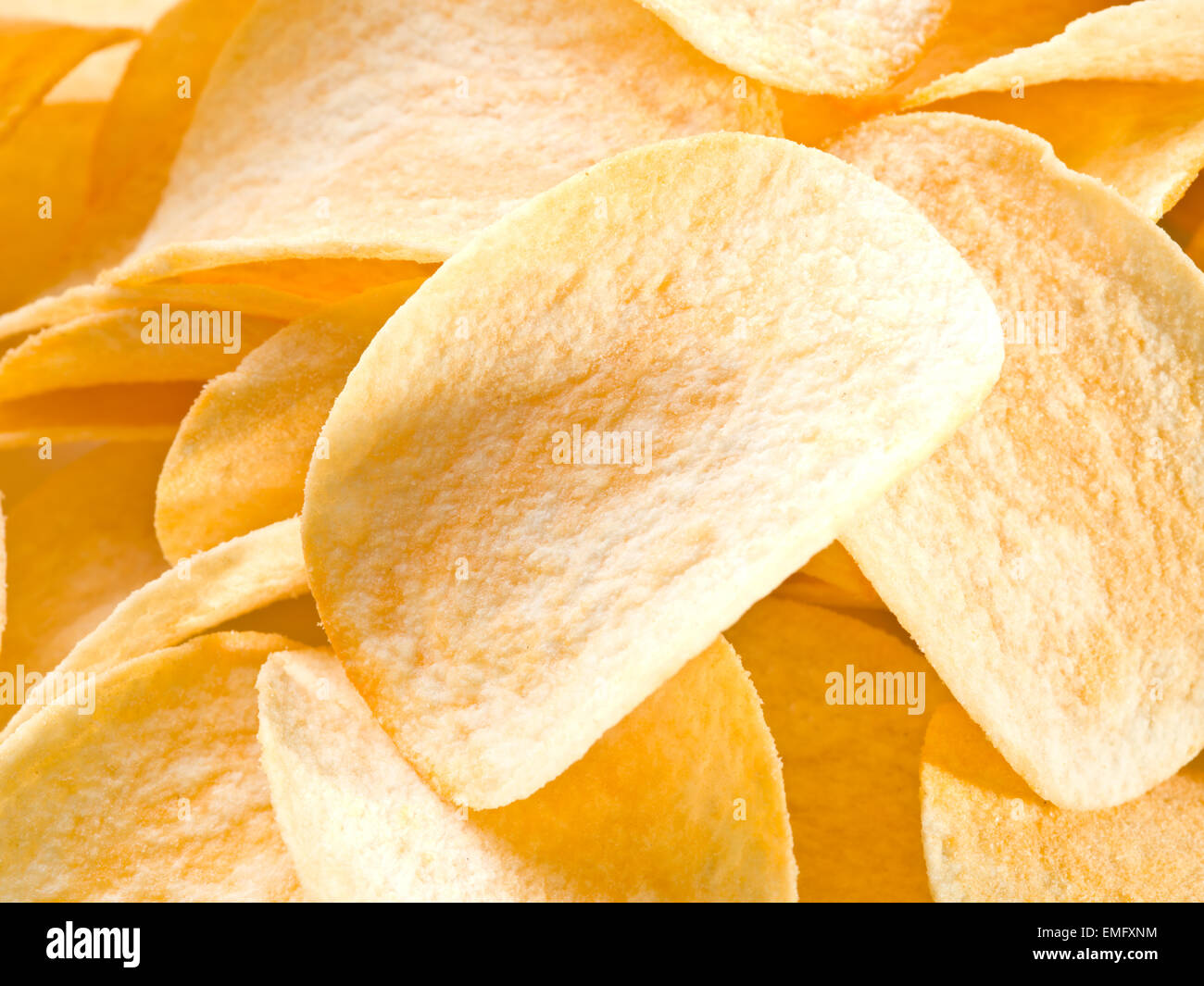 Kartoffel-Chips. Essen-Hintergrund. Stockfoto