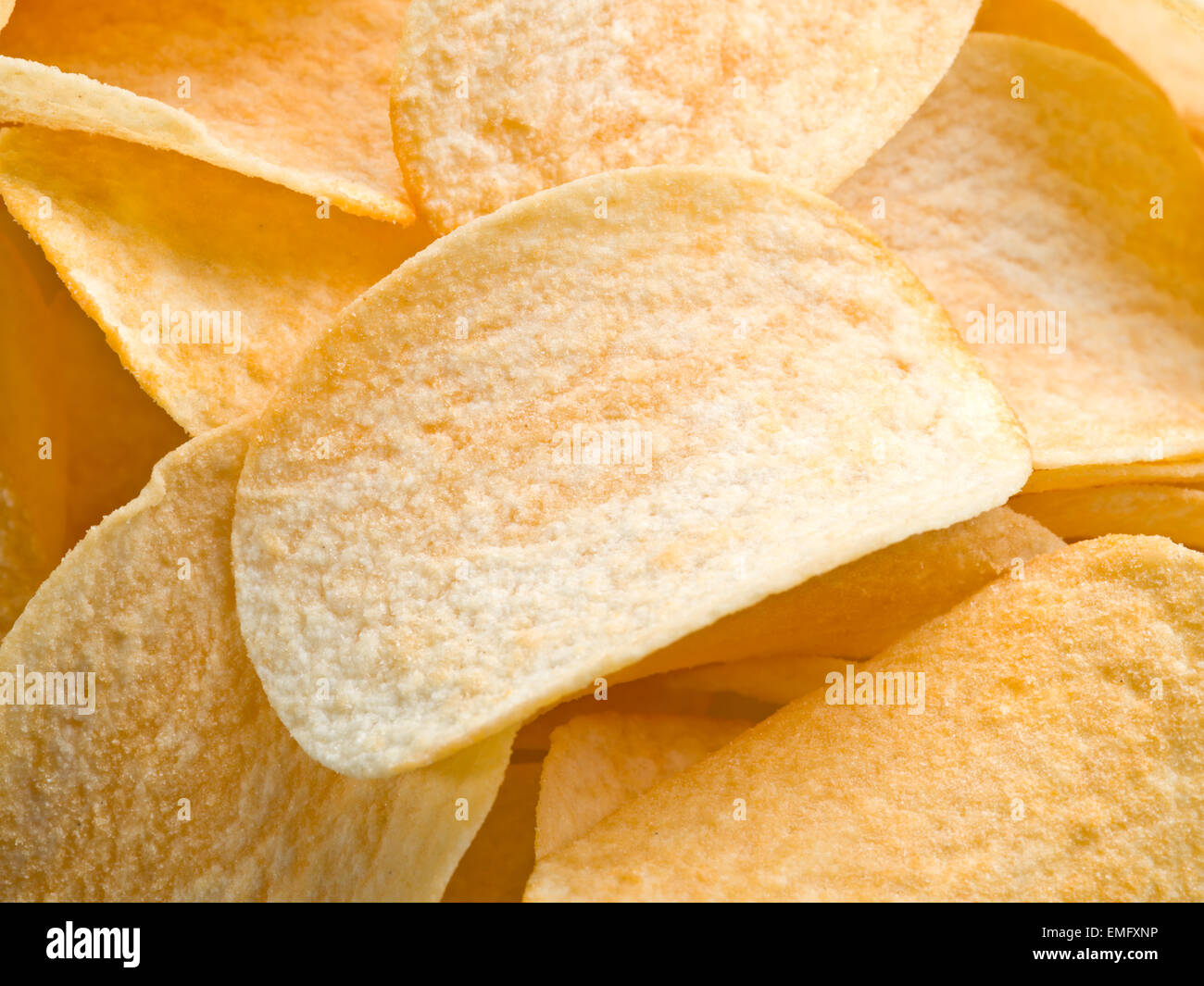 Kartoffel-Chips. Essen-Hintergrund. Stockfoto