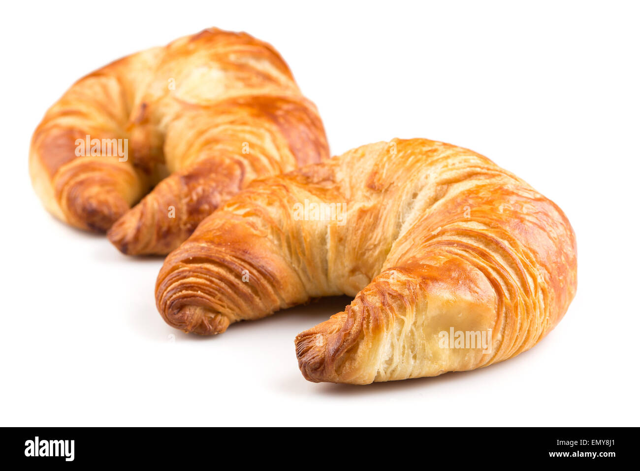 Frische Croissant auf dem weißen Hintergrund isoliert Stockfoto