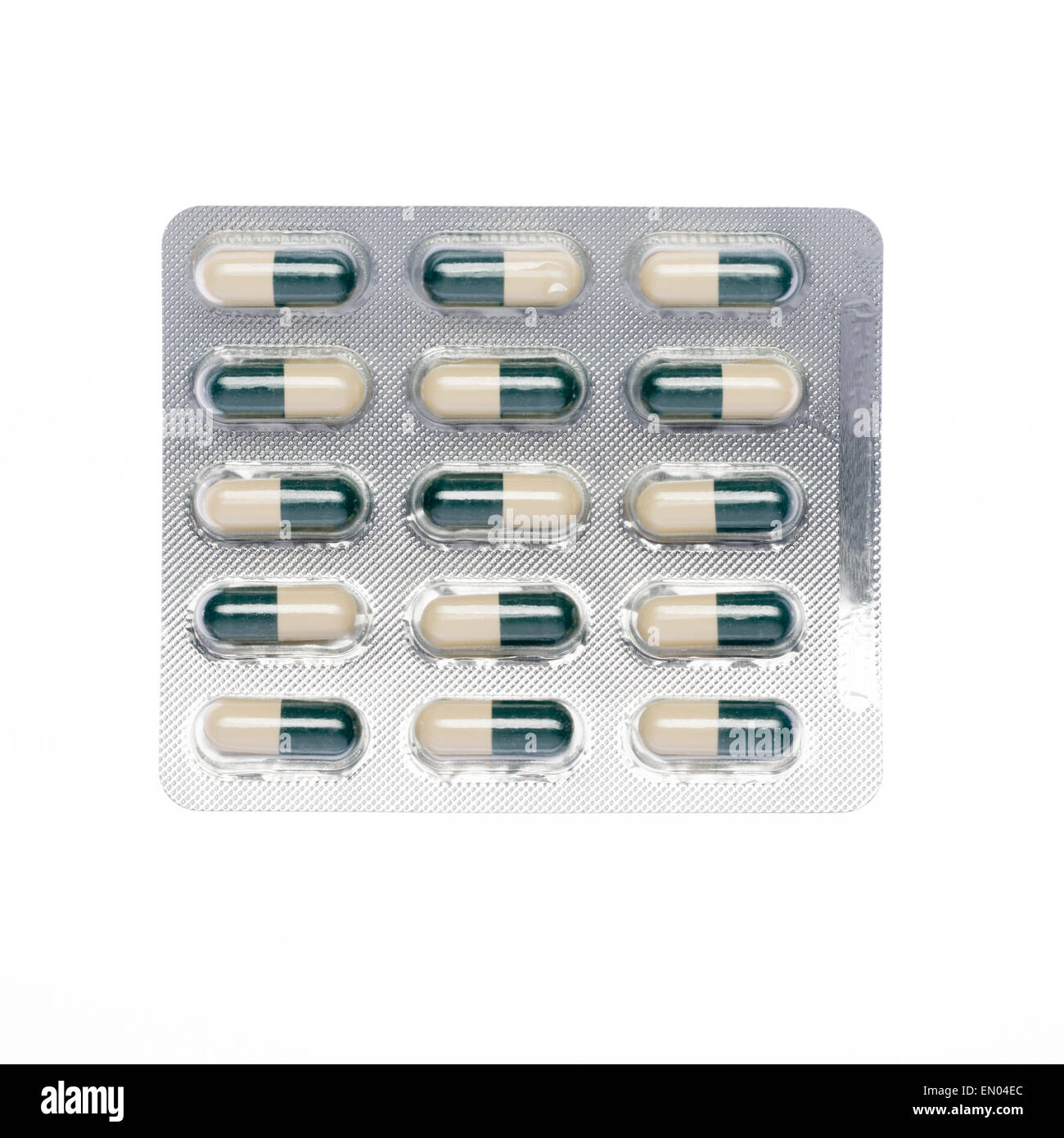 Grauer und grüner Kapseln Pillen Blister Pack auf einem isolierten Hintergrund Stockfoto