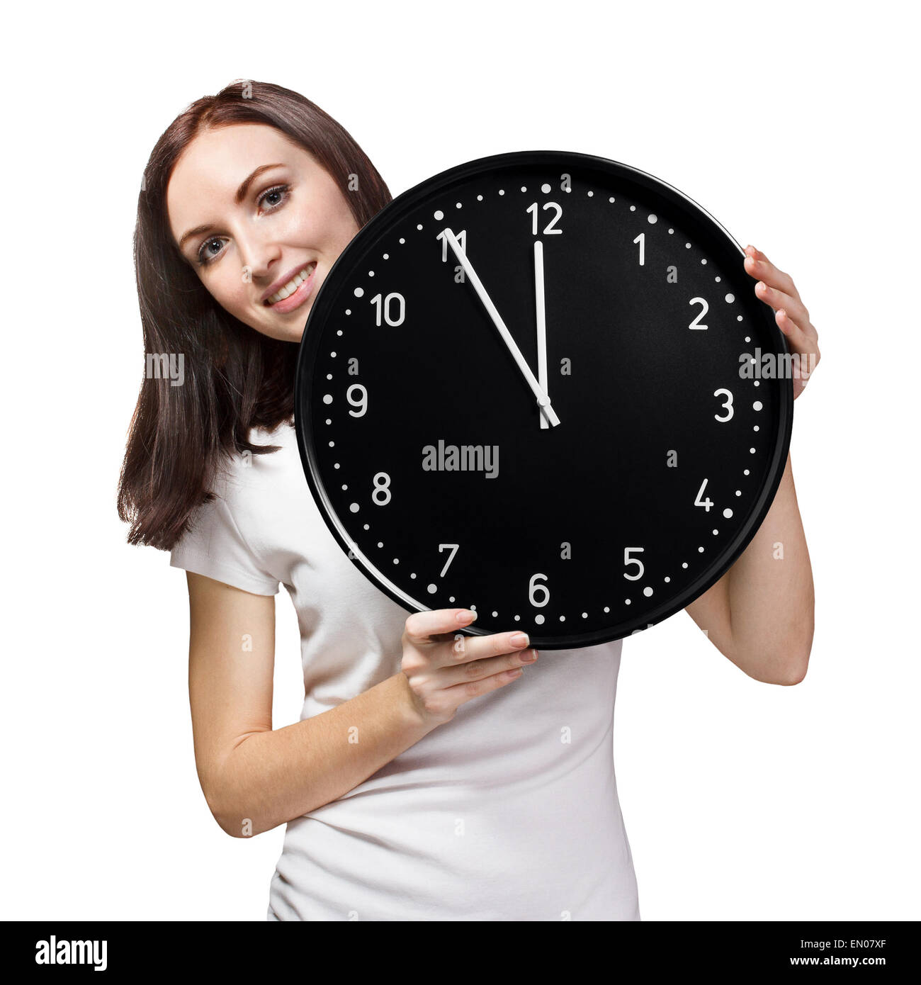 Frau hält eine Büro-Uhr Stockfoto