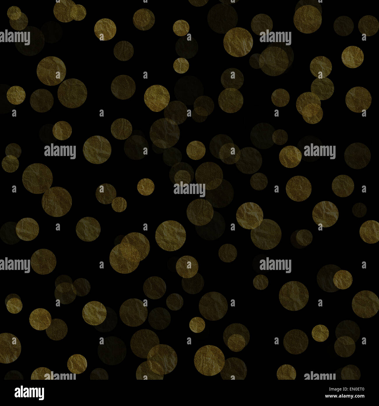 Gold und schwarze Punkte Faux Folie Metallic Muster Hintergrundtextur Stockfoto