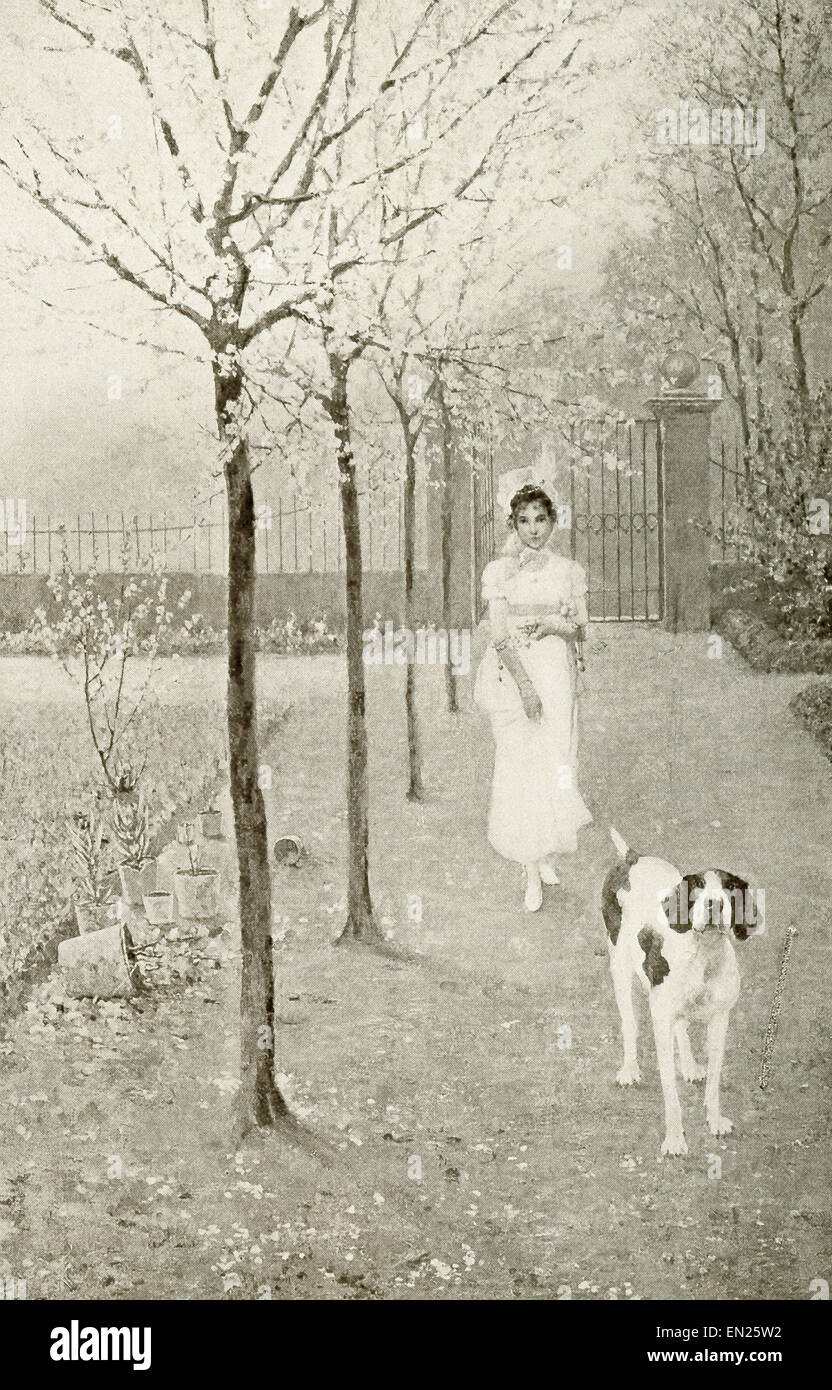 Eine Dame und ihr Hund Fuß auf einem Weg im Frühling. Die Abbildung stammt aus 1917. Stockfoto