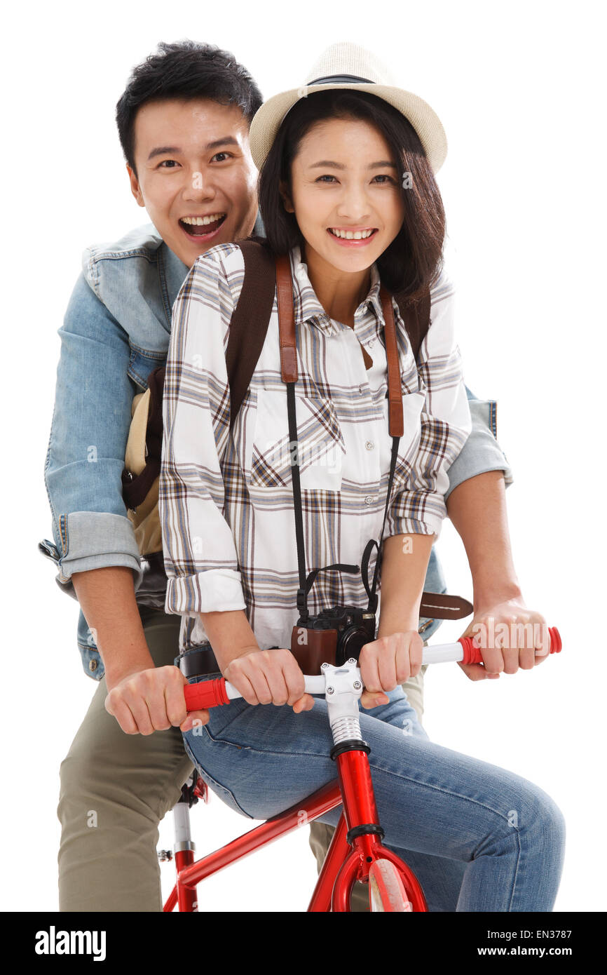 Junge Paare, mit dem Fahrrad reisen Stockfoto