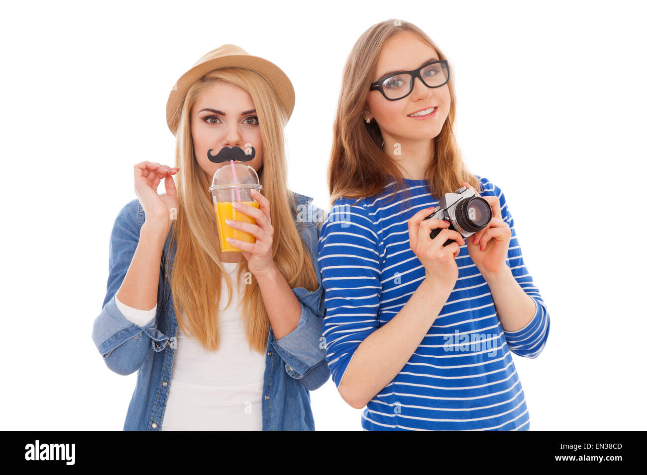 Zwei Hipster Mädchen isoliert auf weißem Hintergrund Stockfoto