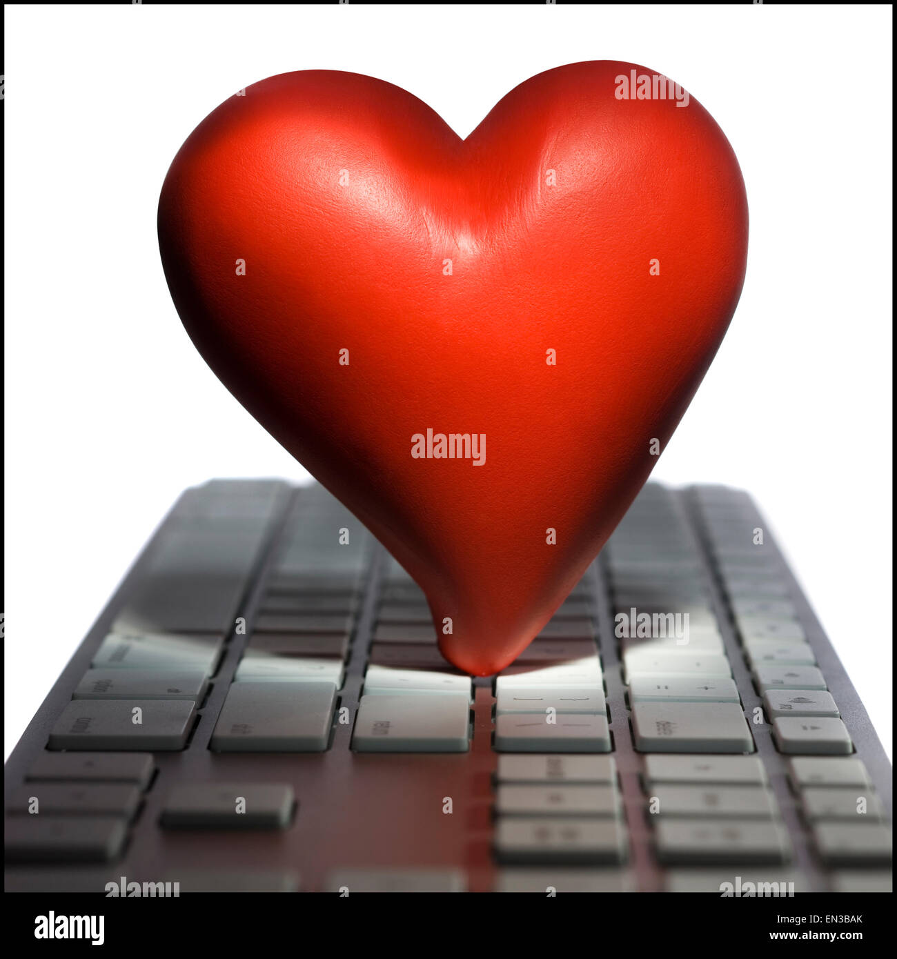 Herz auf einer Computertastatur Stockfoto