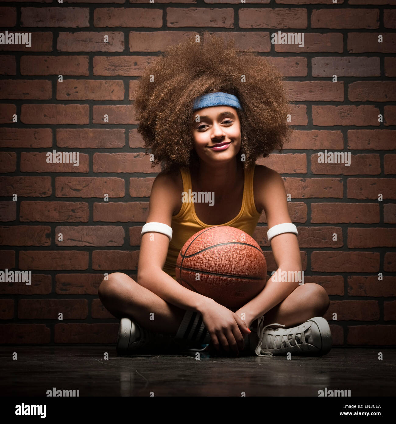 weiblichen Basketball-Spieler mit einem afro Stockfoto