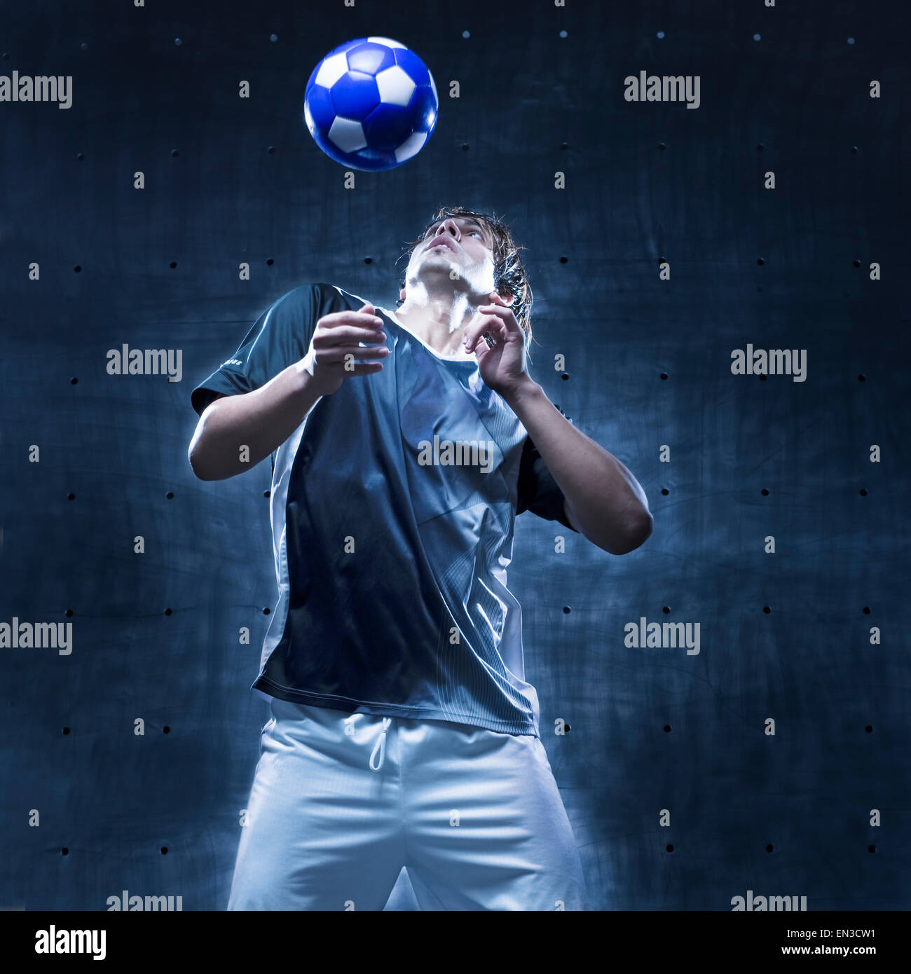 Fußballspieler und-Trainer Stockfoto