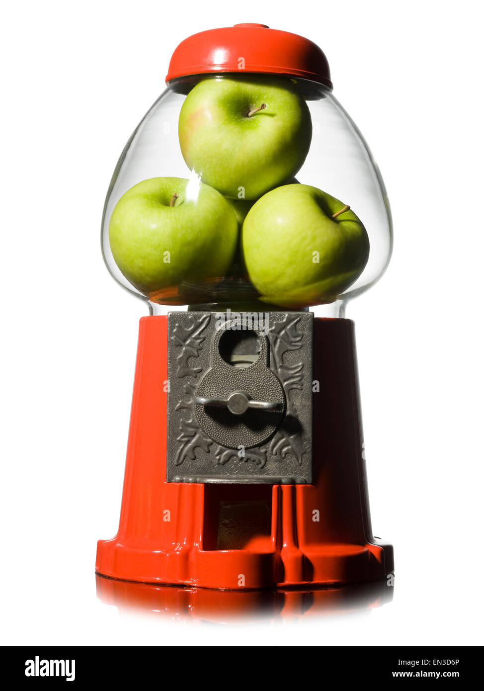 grüne Äpfel in einer Kaugummi-Maschine Stockfoto