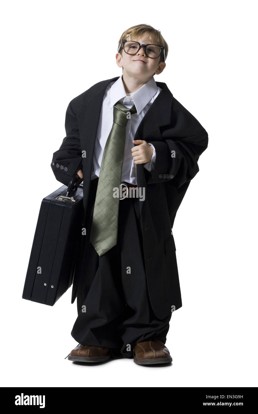Kleiner Junge gekleidet als Führungskraft Stockfoto